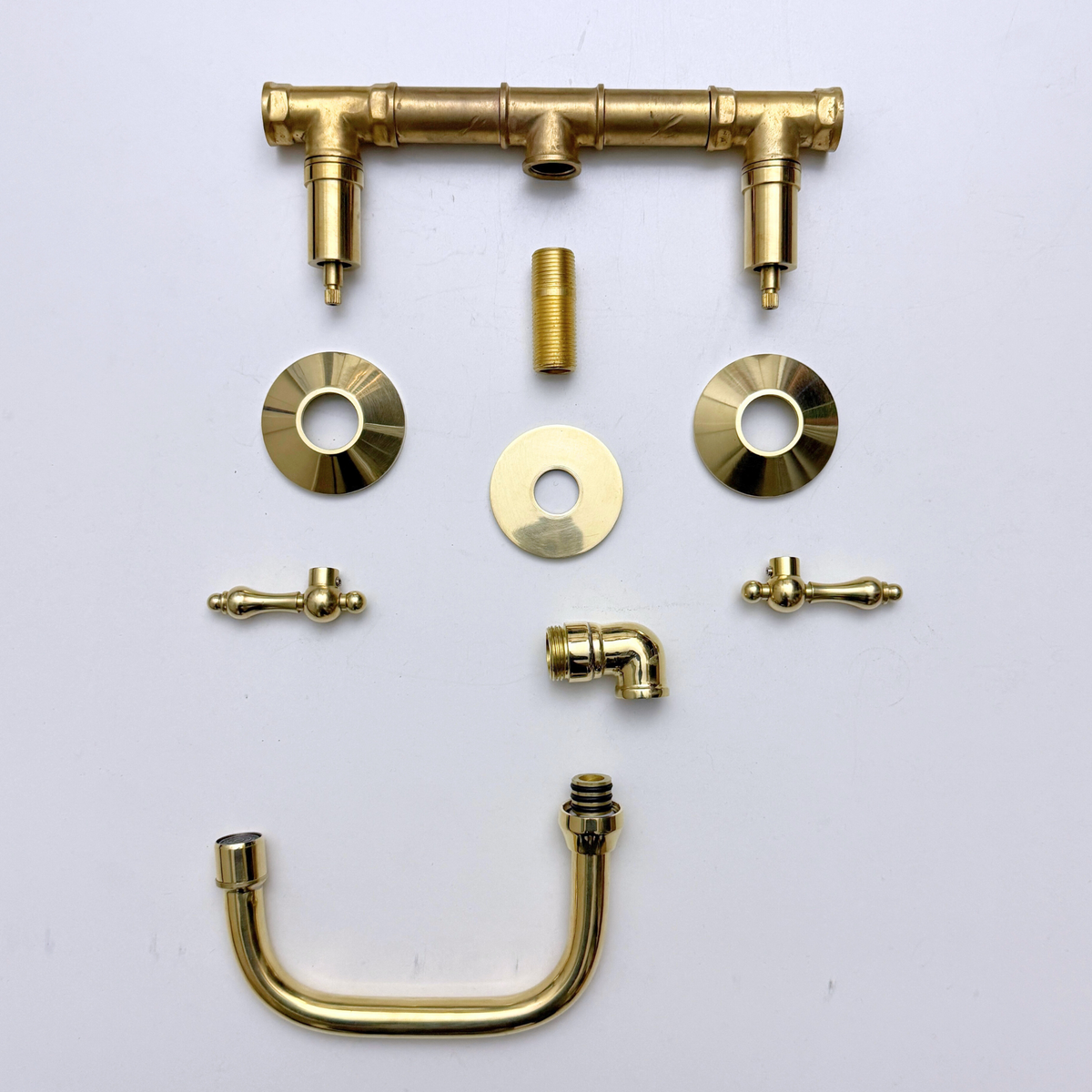 Unlacquered Brass Wall-Mount Bathroom Faucet with Lever handles