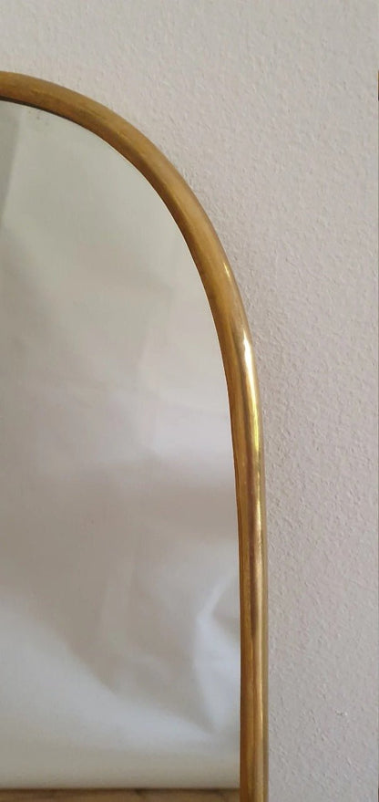 Asymmetrical Brass Framed Wall Mirror with a modern irregular brass frame for stylish wall decor