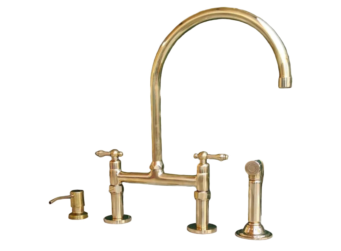 Bridge kitchen faucet with side sprayer in unlacquered brass finish, showcasing durable brass construction and modern design.