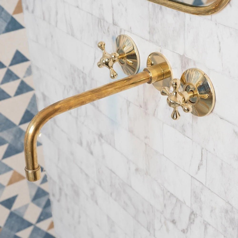 Elegant Vintage Brass Wall-Mounted Faucet with polished brass finish, featuring classic design for bathroom or kitchen installation.