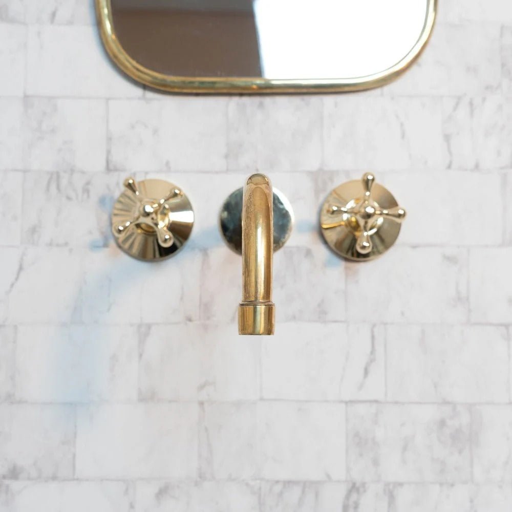 Elegant Vintage Brass Wall-Mounted Faucet in polished brass finish, ideal for classic bathroom or kitchen decor.