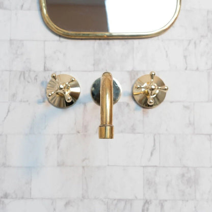 Elegant Vintage Brass Wall-Mounted Faucet in polished brass finish, designed for bathroom or kitchen use by Brasska