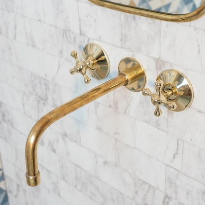 Elegant Vintage Brass Wall-Mounted Faucet with polished brass finish, ideal for bathroom or kitchen installations.