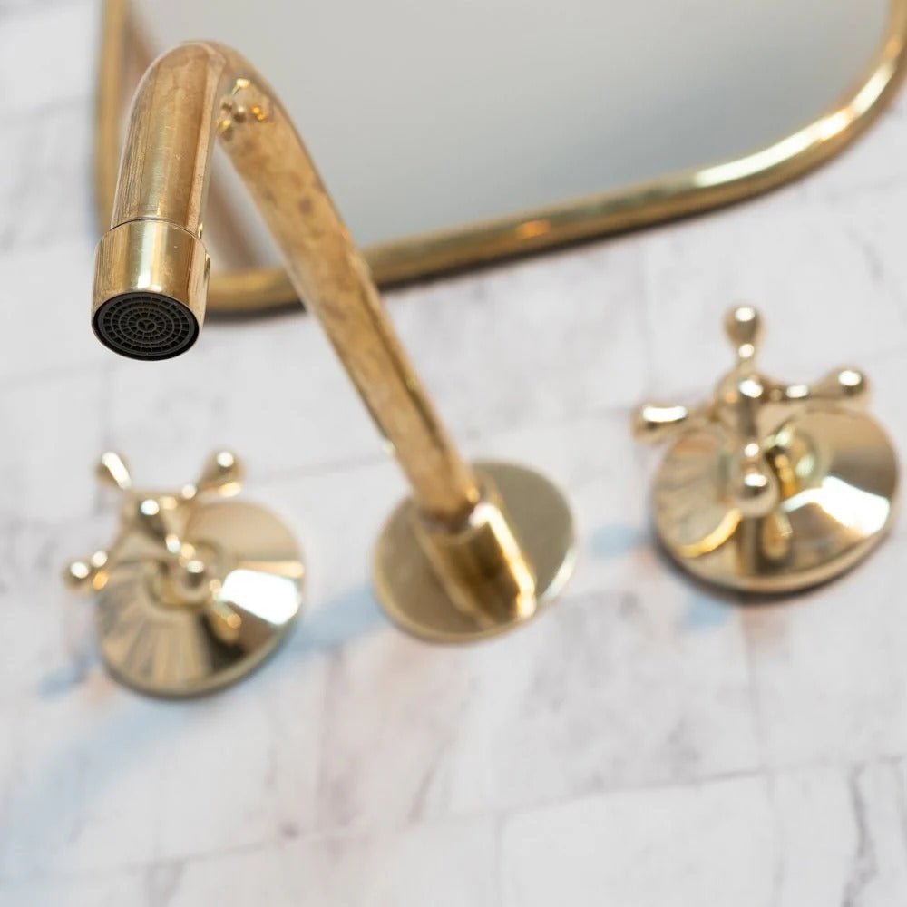 Elegant Vintage Brass Wall-Mounted Faucet with polished brass finish, ideal for classic bathroom or kitchen decor.