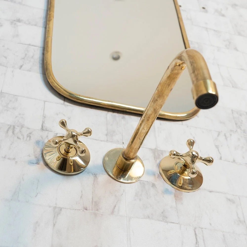 Elegant Vintage Brass Wall-Mounted Faucet in polished brass finish, ideal for bathroom or kitchen installation by Brasska