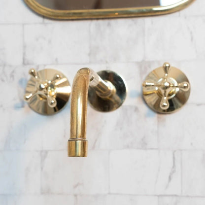 Elegant Vintage Brass Wall-Mounted Faucet with polished brass finish, suitable for classic bathroom or kitchen decor.