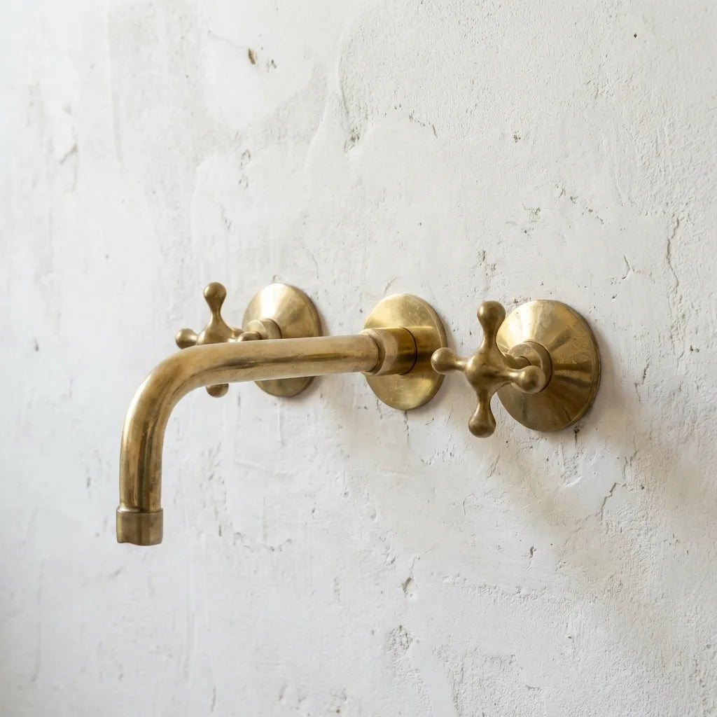 Handcrafted Three-Hole Unlacquered Brass Wall Mounted Vanity Faucet - Brasska