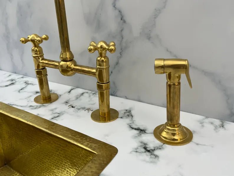 Luxury Bridge Kitchen Faucet Set with side sprayer and soap dispenser in unlacquered brass finish by Brasska