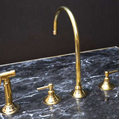 Unlacquered Brass Gooseneck Deck Mounted Kitchen Faucet with curved spout and single handle for traditional kitchen use