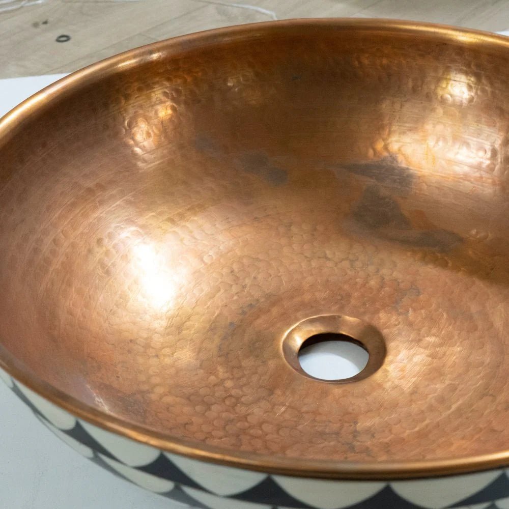 Handmade Copper Vessel Sink with Antique Wood Finish by Brasska, featuring a hammered copper interior and patterned exterior.
