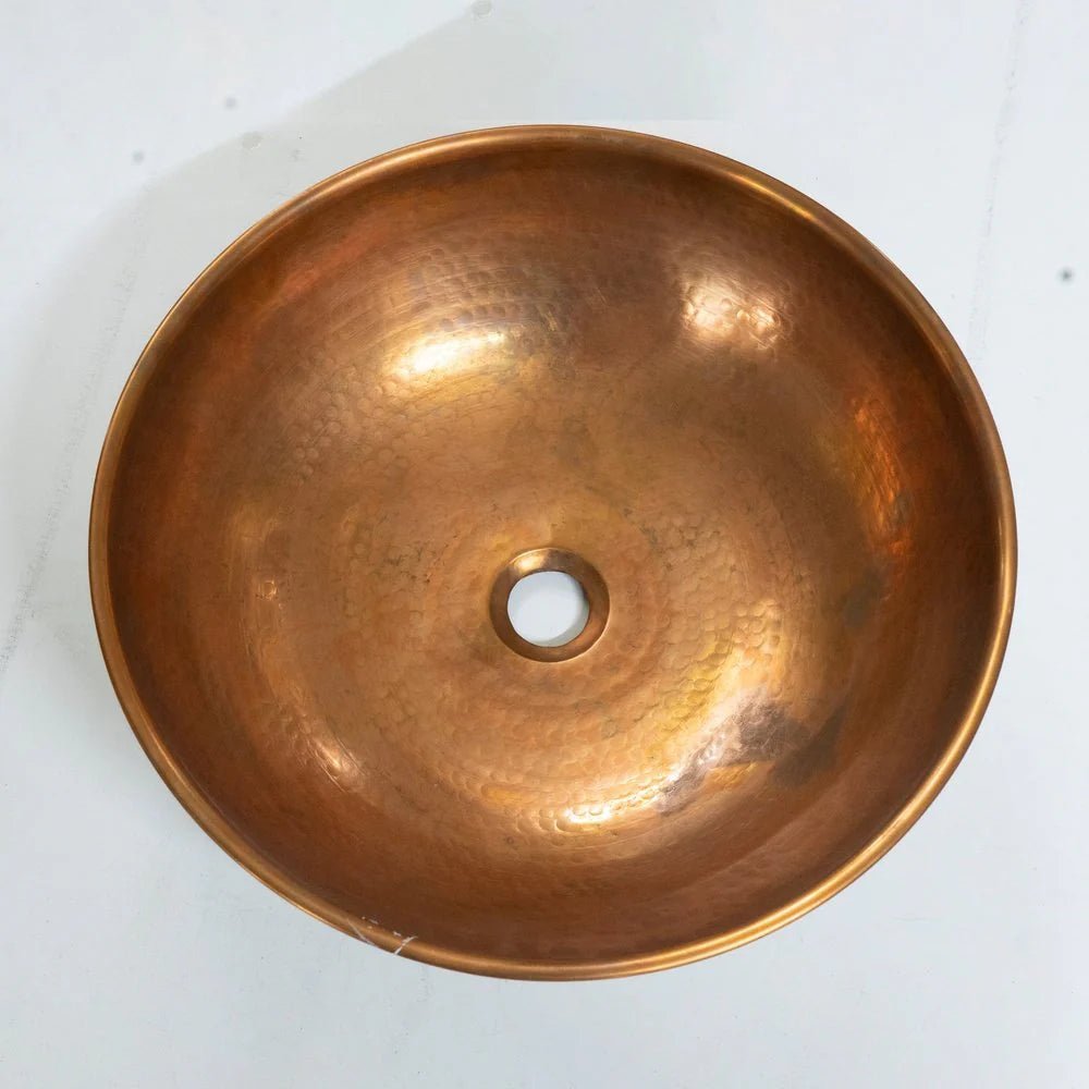 Handmade Copper Vessel Sink with Antique Wood Finish by Brasska, round hammered copper basin with central drain hole.