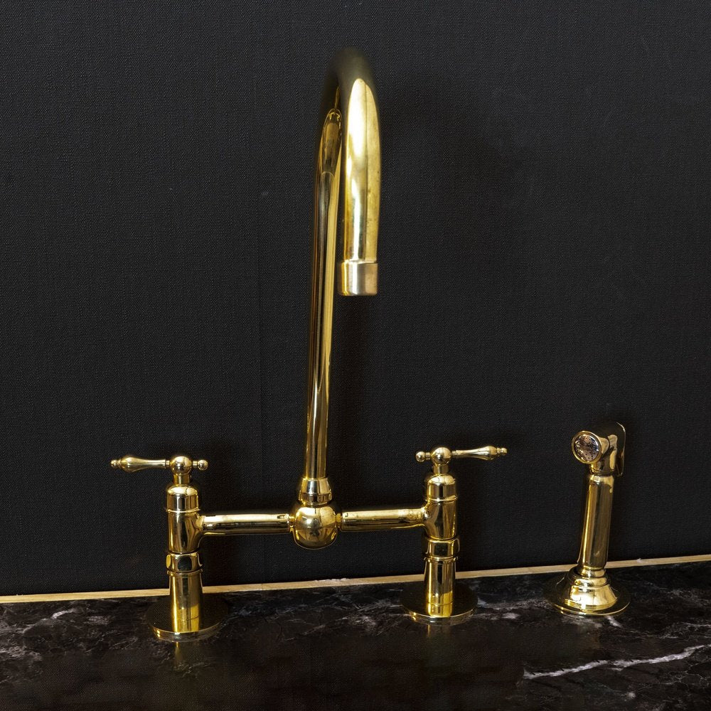 Victorian Bridge Kitchen Faucet with Side Sprayer in unlacquered brass, featuring vintage design and durable metal construction.