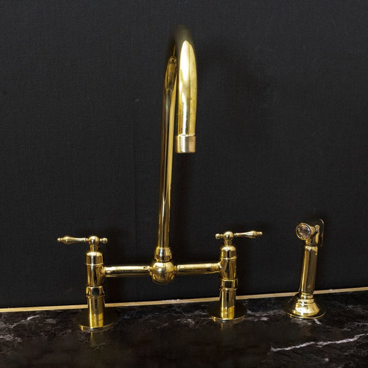 Victorian Bridge Kitchen Faucet with Side Sprayer in unlacquered brass, featuring vintage design and durable metal construction.