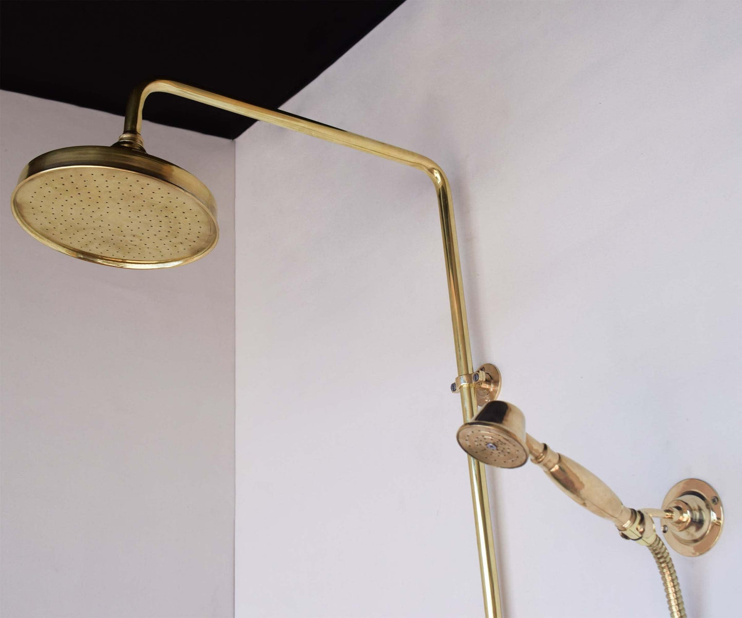 Unlacquered brass exposed shower system